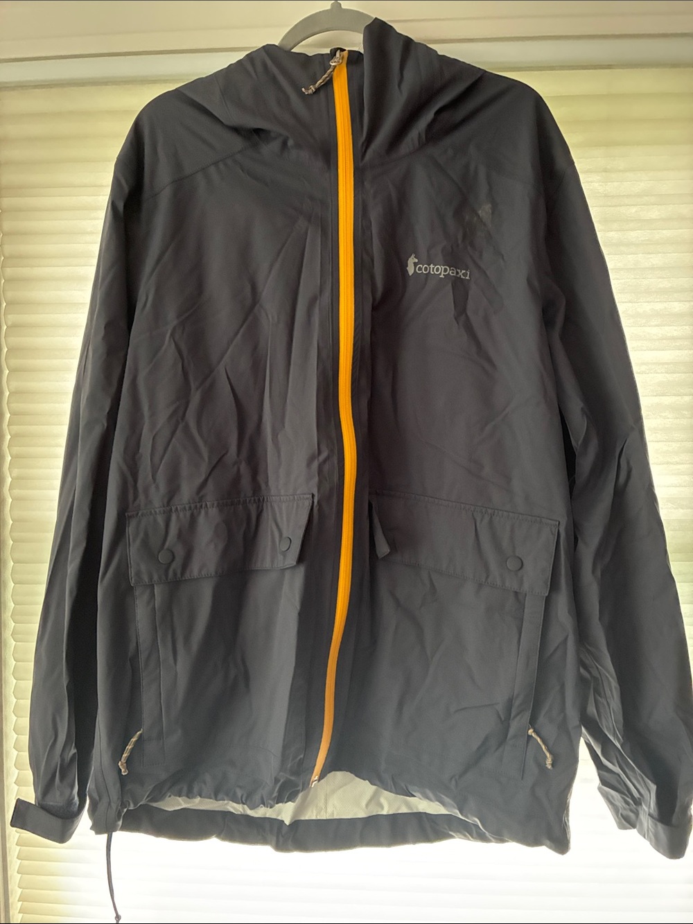 cotopaxi Gray Hooded Windbreaker with Yellow Zipper